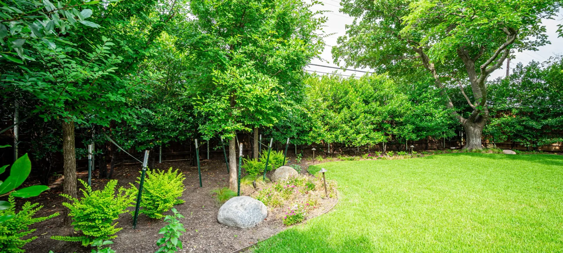 How Poor Drainage Shortens the Life of Landscape Installations in Dallas and Highland Park, TX