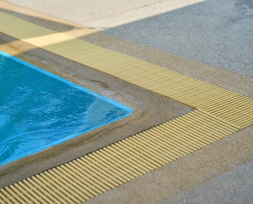 The Importance of Drainage Solutions in Poolside Landscape Design