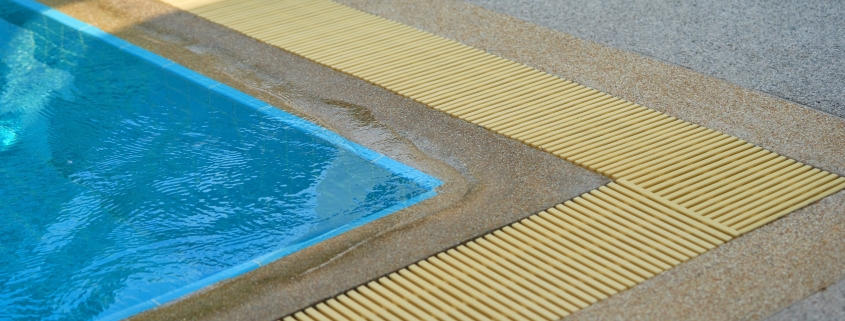 The Importance of Drainage Solutions in Poolside Landscape Design