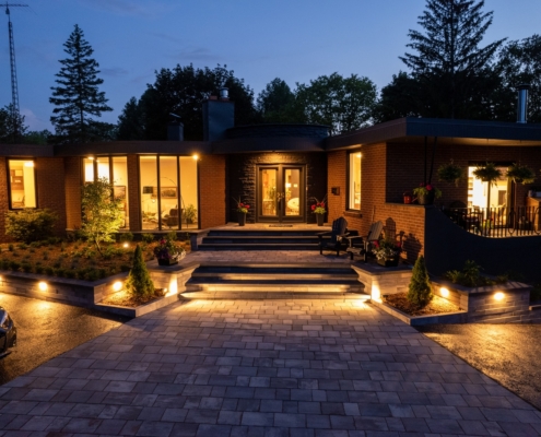 How Lighting Placement Around Retaining Walls Improves Safety In Dallas And Lakewood, TX Outdoor Spaces